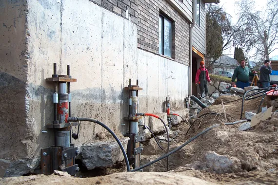 Foundation crack repair using professional equipment